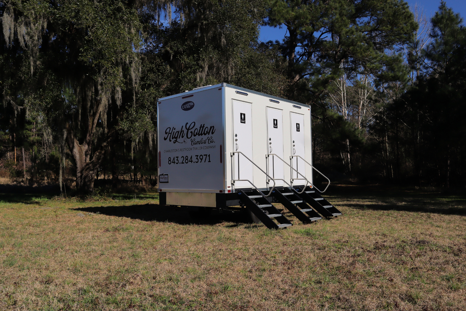 Luxury 3-stall restroom trailer by High Cotton Comfort Co for Charleston events, featuring climate-controlled interiors, private entrances, and upscale amenities for weddings and outdoor gatherings